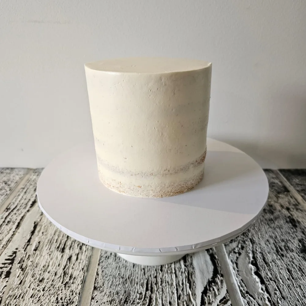 Plain semi-naked cake ready for custom decoration, made by Amour Desserts in Melbourne